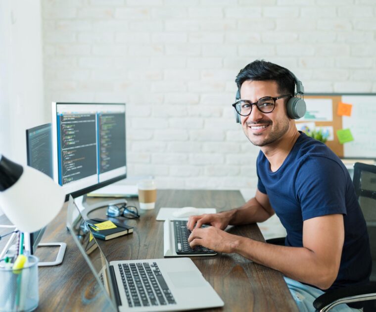 young person working on a desktop computer