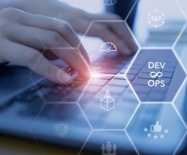 devops terms surrounding a person using a laptop