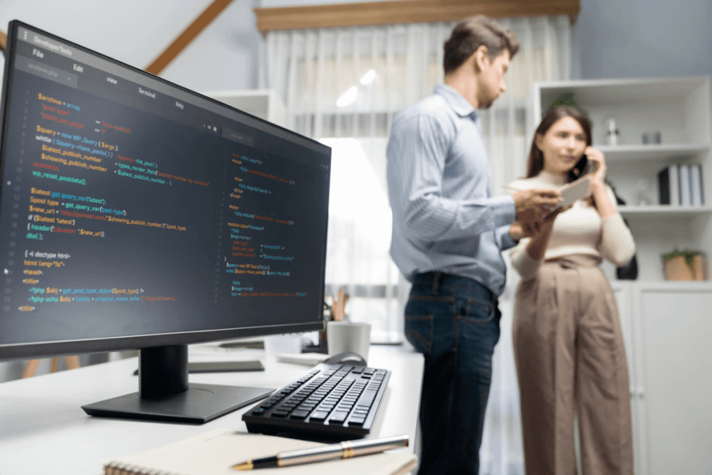 Colleagues Writing Code