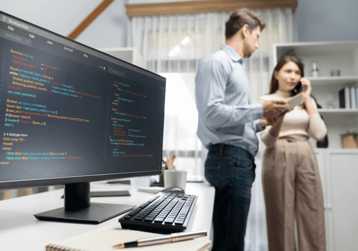 Colleagues Writing Code
