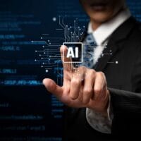 ai symbol being pressed by a man in a suit