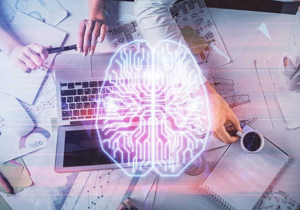 vector icon of a brain overlayed a laptop