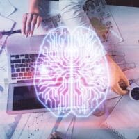 vector icon of a brain overlayed a laptop